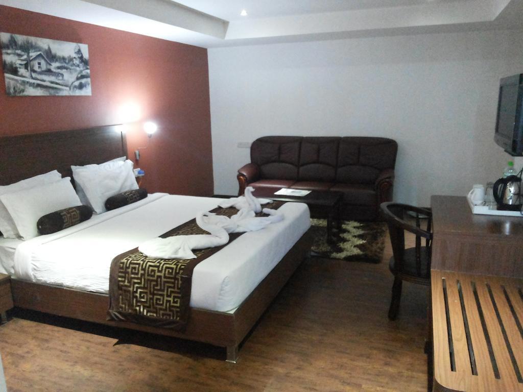 Hotel Milestonnez Sriperumbudur Phòng bức ảnh