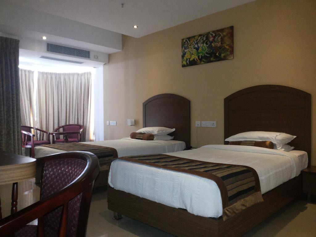 Hotel Milestonnez Sriperumbudur Phòng bức ảnh